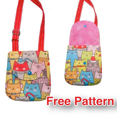 A small multicolored fabric bag with a cat pattern, featuring a red strap and a snap closure, indicating it is a free pattern version.